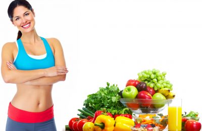 Young healthy woman with fruits.