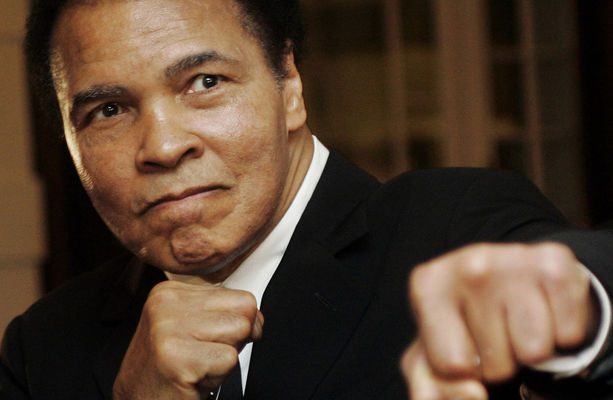 U.S. boxing great Muhammad Ali poses during the Crystal Award ceremony at the World Economic Forum (WEF) in Davos, Switzerland January 28, 2006. REUTERS/Andreas Meier - RTXYWIU