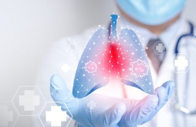 Doctors wearing masks and gloves Shows a graphical computer interface connected to a medical network. Treatment of lung disease caused by the coronavirus. Concept of health care and medical technology