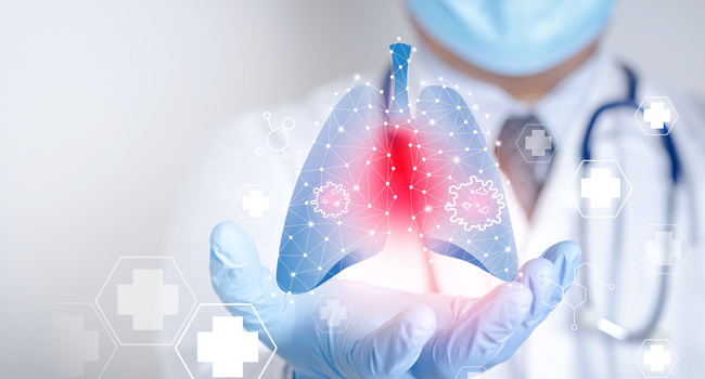 Doctors wearing masks and gloves Shows a graphical computer interface connected to a medical network. Treatment of lung disease caused by the coronavirus. Concept of health care and medical technology